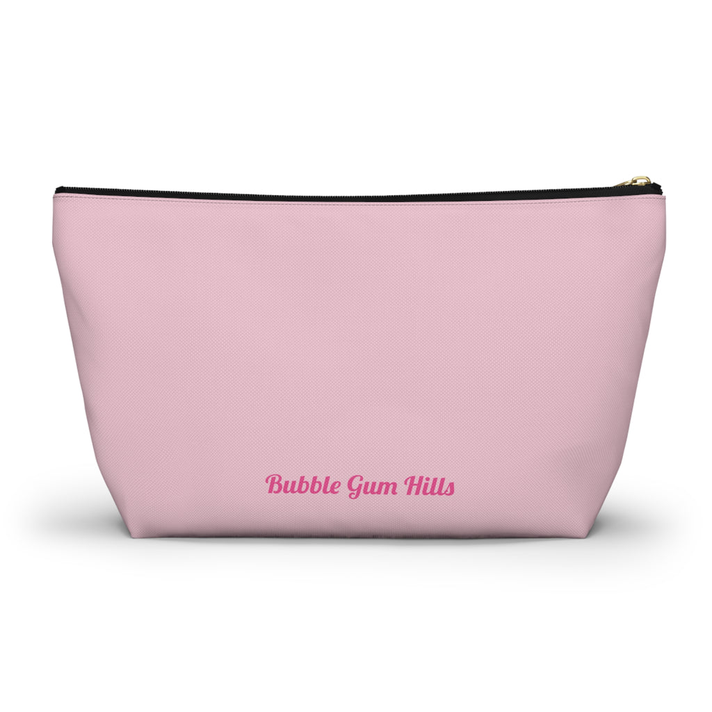 Bubble Gum Hills Pop Art CosmeticAccessories Bag Zipper Cute travel makeup bag with a wide T-bottom structure standing upright on a counter