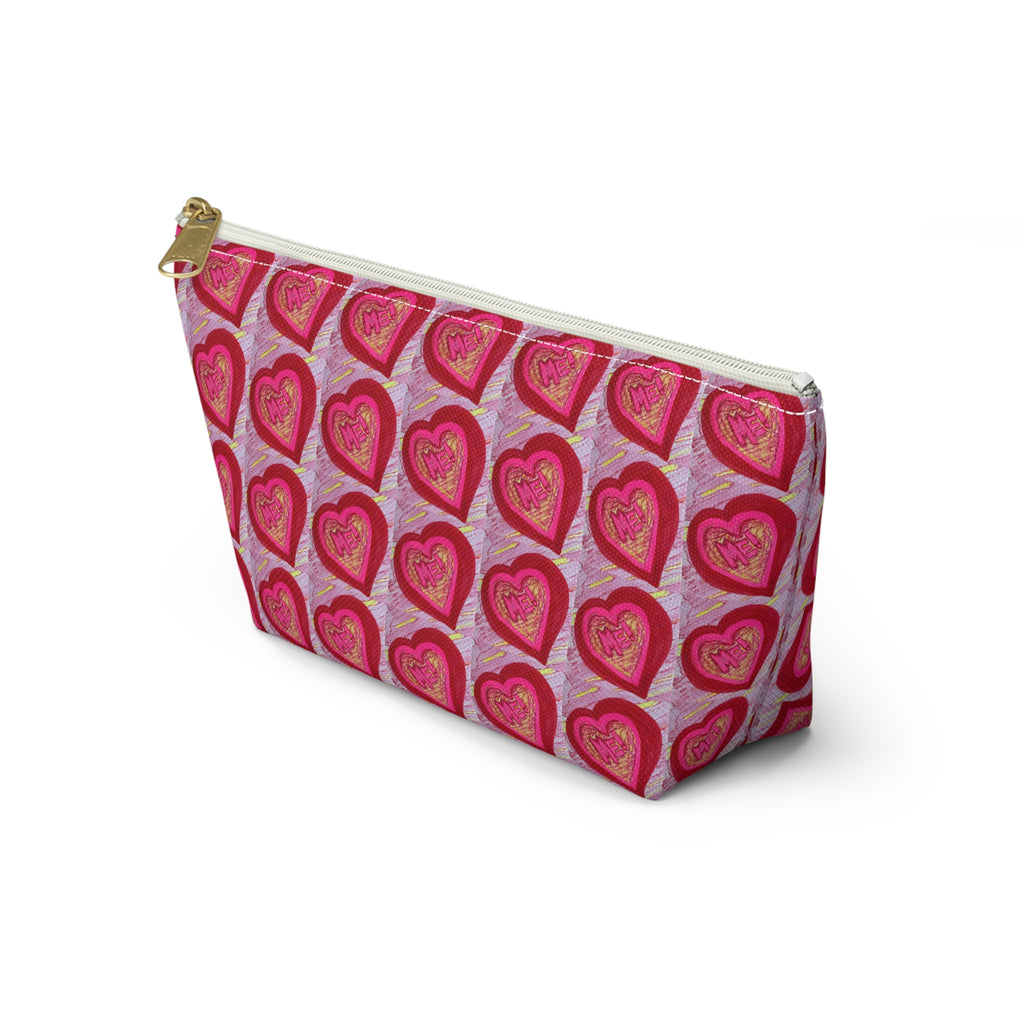 A zippered cosmetic pouch featuring a repeating pattern of red and pink hearts with gold outlines on a light pink background, shown on a white studio background.
