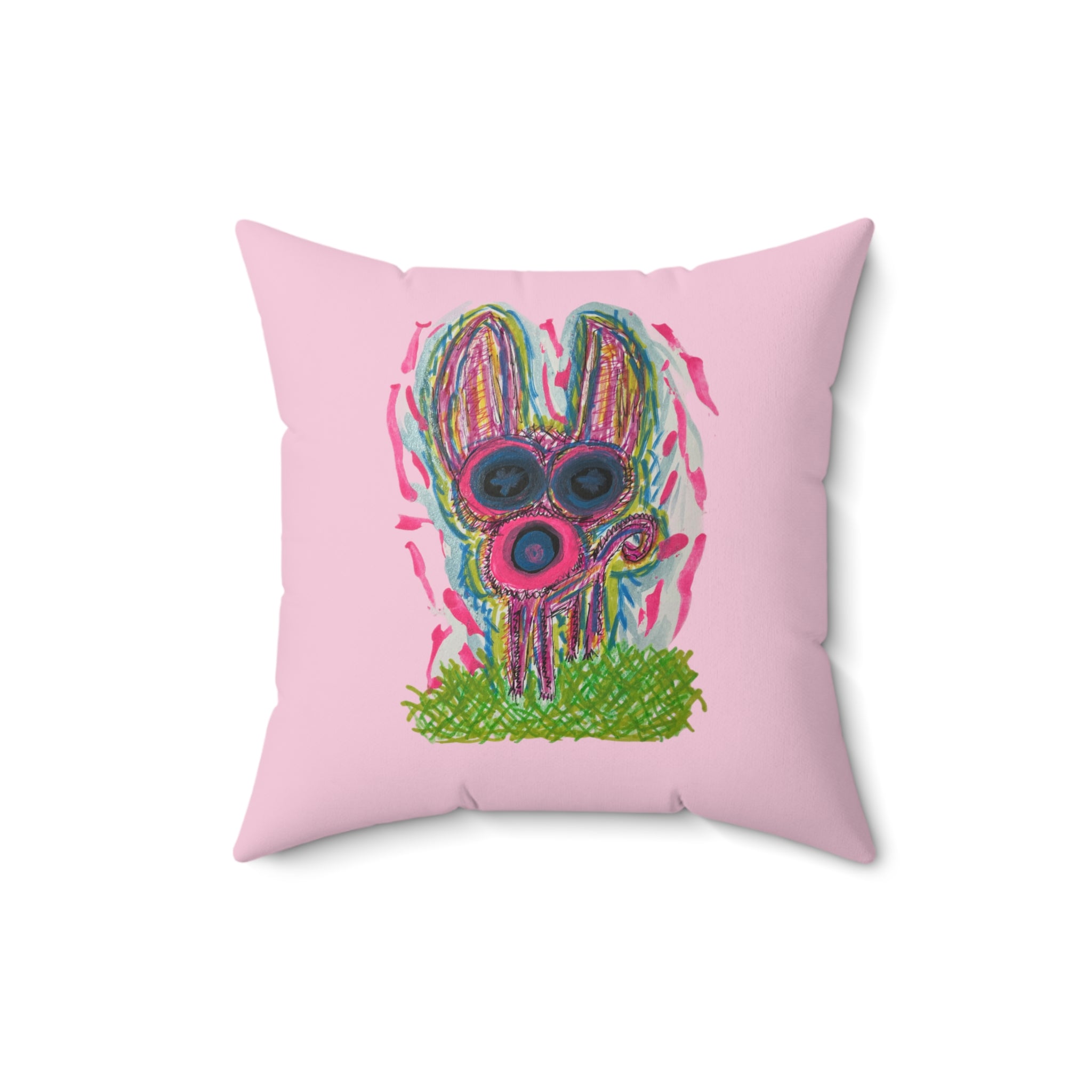 A square pink throw pillow featuring a colorful, whimsical cartoon rabbit illustration in the center, set against a plain white background. Dog Lovers