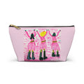 Pink accessory pouch featuring a hand-painted pop art design of three dancers against a blush background. Zipper Bag