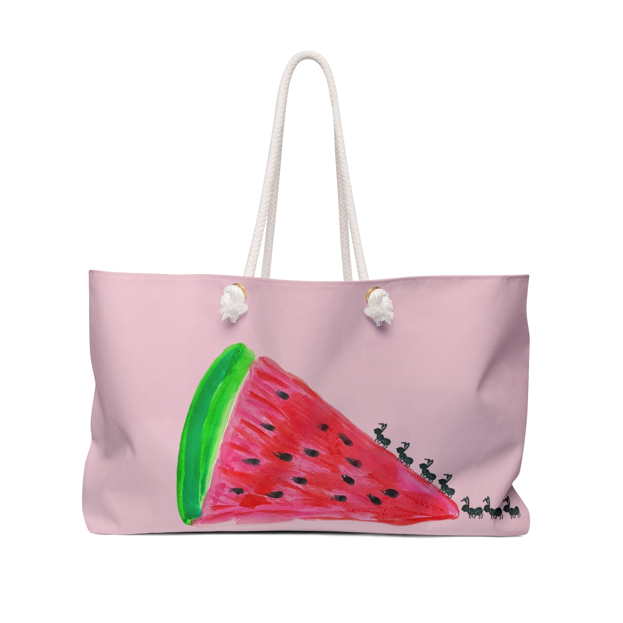 A light pink tote bag with white rope handles, featuring a hand-painted watermelon design on the front with a green rind, red flesh, black seeds, and a line of small black birds.